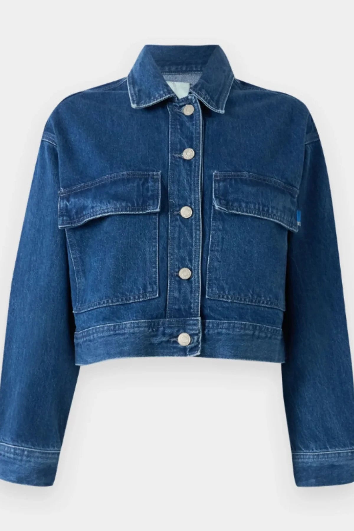 Blue denim jacket on a white background