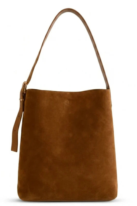 Brown leather handbag on a white background